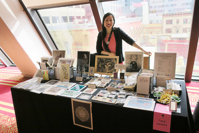 Artist table booth, photo of Sherrie Thai of Shaireproductions.com